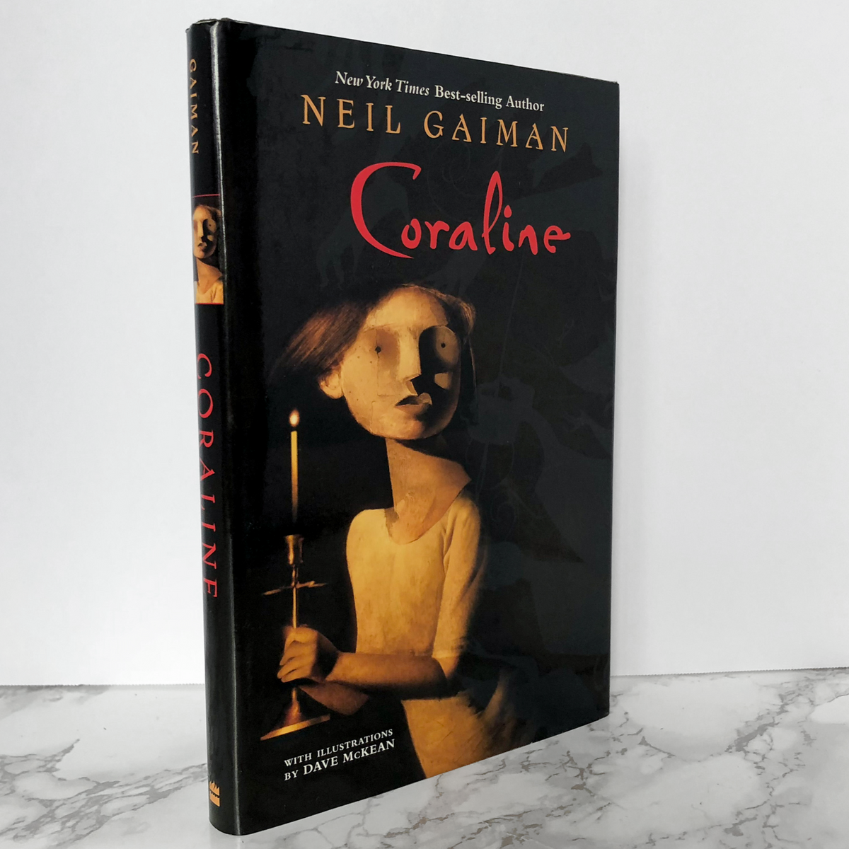 Coraline by Neil Gaiman, First Edition and Twenty Third Printing,  Illustrated by Dave Mckean, Published 2002 by Harpercollins 