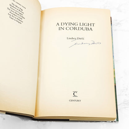 A Dying Light in Corduba by Lindsey Davis SIGNED! [U.K. FIRST EDITION • FIRST PRINTING] 1996 • Century