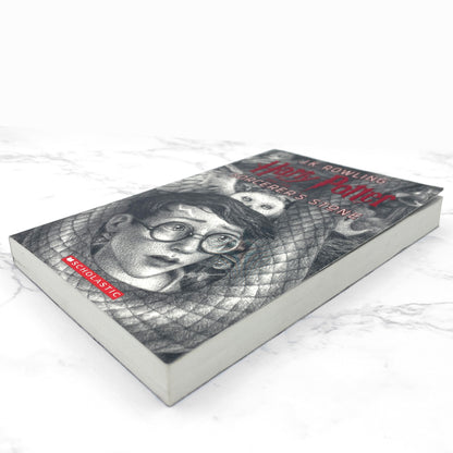 Harry Potter and the Sorcerer's Stone by J.K. Rowling [20th ANNIVERSAY TRADE PAPERBACK] • Scholastic