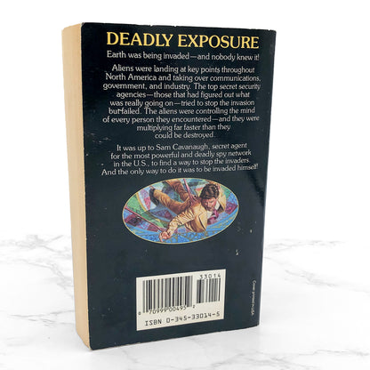 The Puppet Masters by Robert A. Heinlein [FIRST REVISED + UNCUT PRINTING] 1990 • Del-Rey