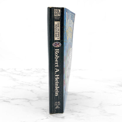 The Puppet Masters by Robert A. Heinlein [FIRST REVISED + UNCUT PRINTING] 1990 • Del-Rey