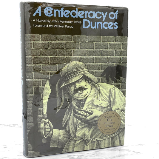 A Confederacy of Dunces by John Kennedy Toole [FIRST EDITION] 1980 • Louisiana State University • 13th Printing / 1994