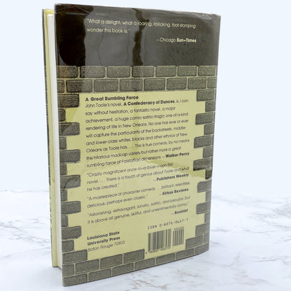 A Confederacy of Dunces by John Kennedy Toole [FIRST EDITION] 1980 • Louisiana State University • 13th Printing / 1994