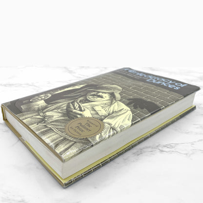 A Confederacy of Dunces by John Kennedy Toole [FIRST EDITION] 1980 • Louisiana State University • 13th Printing / 1994