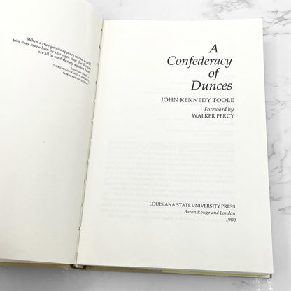 A Confederacy of Dunces by John Kennedy Toole [FIRST EDITION] 1980 • Louisiana State University • 13th Printing / 1994