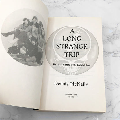 A Long Strange Trip: The Inside History of the Grateful Dead by Dennis McNally [FIRST PAPERBACK EDITION] 2003