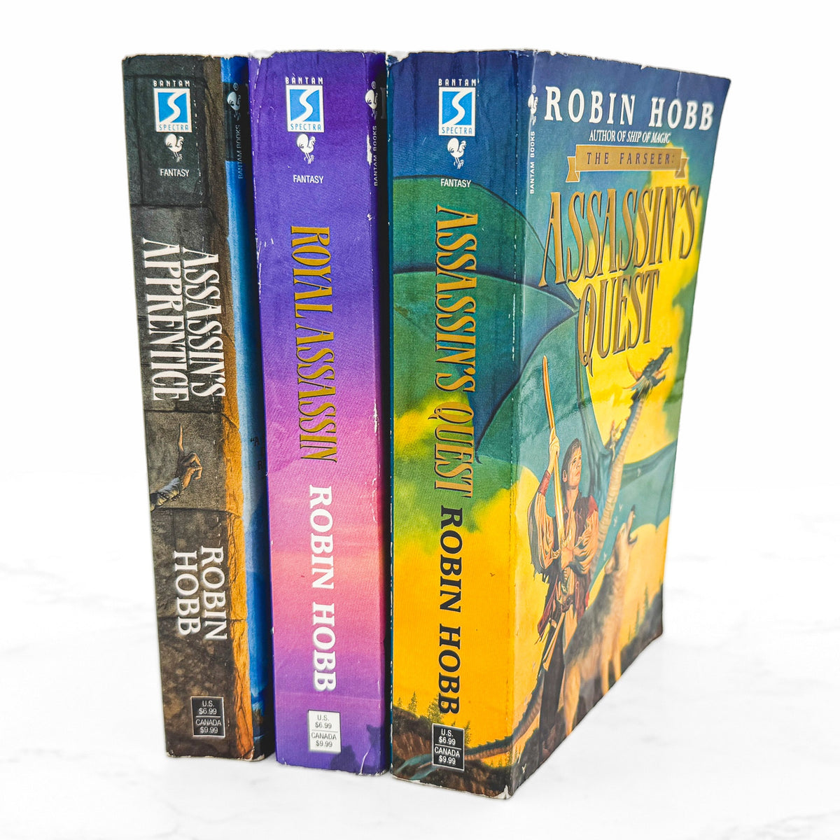 The Farseer Trilogy: Assassin's Apprentice, Royal Assassin, Assassin's Quest by Robin Hobb [THREE PAPERBACK SET] 1998 • Bantam Spectra *See Condition