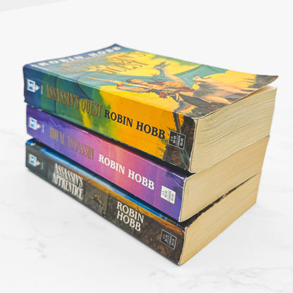 The Farseer Trilogy: Assassin's Apprentice, Royal Assassin, Assassin's Quest by Robin Hobb [THREE PAPERBACK SET] 1998 • Bantam Spectra *See Condition