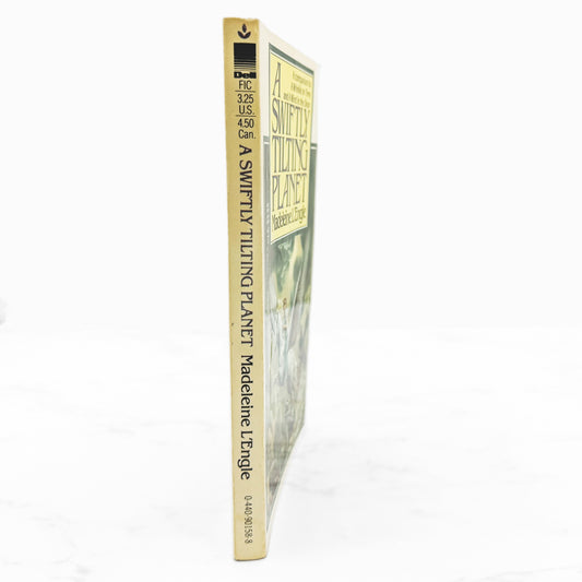 A Swiftly Tilting Planet by Madeleine L'Engle [FIRST PAPERBACK EDITION] 1979 • Laurel-Leaf