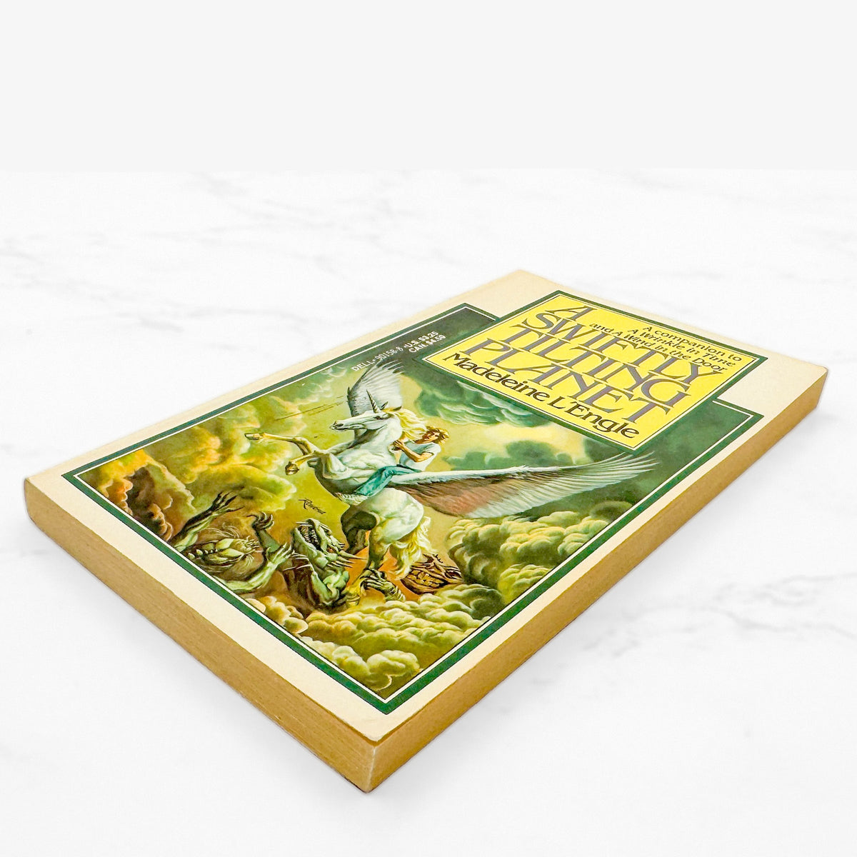 A Swiftly Tilting Planet by Madeleine L'Engle [FIRST PAPERBACK EDITION] 1979 • Laurel-Leaf