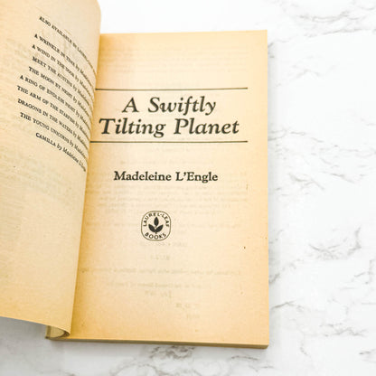 A Swiftly Tilting Planet by Madeleine L'Engle [FIRST PAPERBACK EDITION] 1979 • Laurel-Leaf