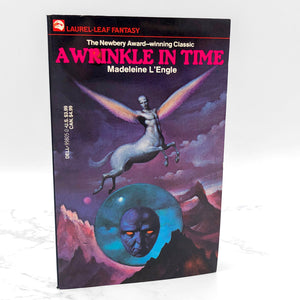 A Wrinkle in Time by Madeleine L'Engle [1976 PAPERBACK] Dell • Laurel-Leaf