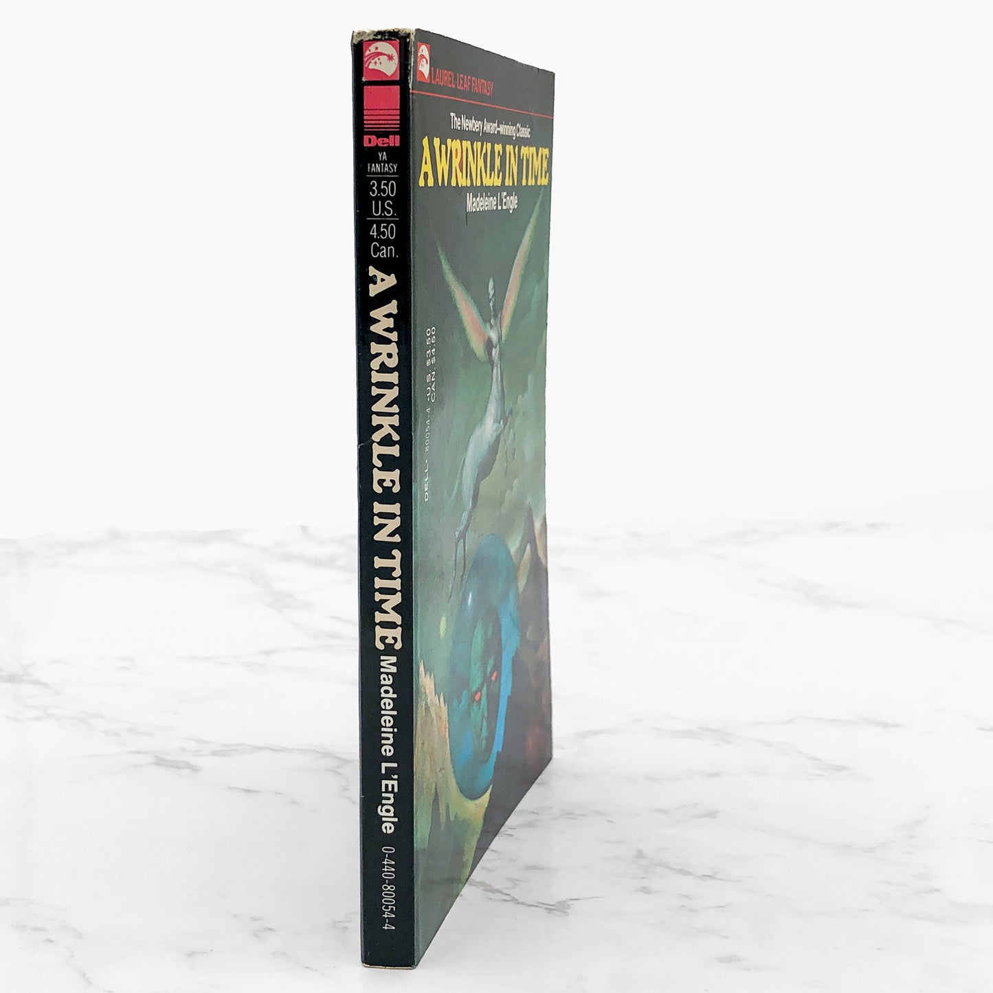 A Wrinkle in Time by Madeleine L'Engle [1976 PAPERBACK] Dell • Laurel-Leaf