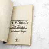 A Wrinkle in Time by Madeleine L'Engle [1976 PAPERBACK] Dell • Laurel-Leaf