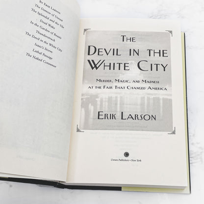 The Devil in the White City by Erik Larson [FIRST EDITION] 2003 • Crown • Later Printing