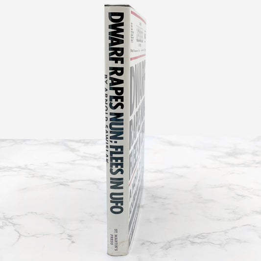 Dwarf Rapes Nun; Flees in UFO: A Novel of Journalism by Arnold Sawislak [FIRST EDITION • FIRST PRINTING] 1985 • St. Martin's Press