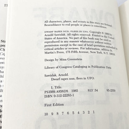 Dwarf Rapes Nun; Flees in UFO: A Novel of Journalism by Arnold Sawislak [FIRST EDITION • FIRST PRINTING] 1985 • St. Martin's Press