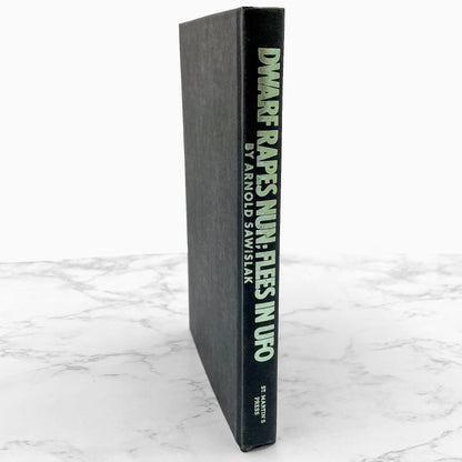 Dwarf Rapes Nun; Flees in UFO: A Novel of Journalism by Arnold Sawislak [FIRST EDITION • FIRST PRINTING] 1985 • St. Martin's Press