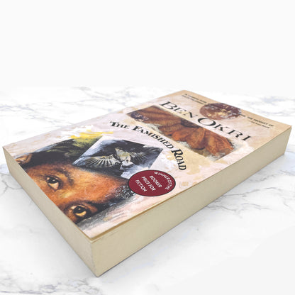 The Famished Road by Ben Okri [FIRST U.S. PAPERBACK EDITION] 1993 • Anchor Books