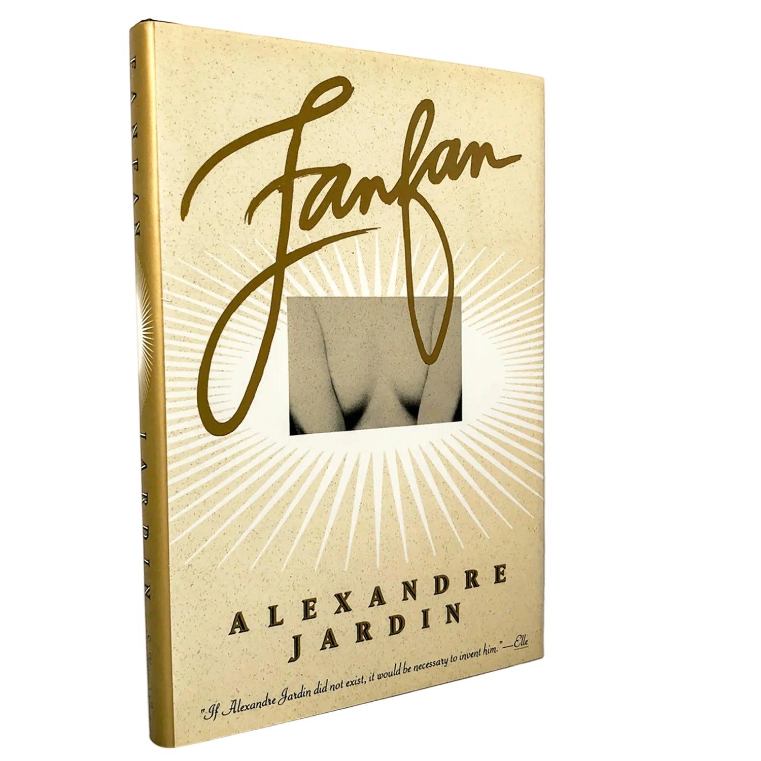 A hardcover book titled 'Fanfan' by Alexandre Jardin, featuring a textured beige cover with a gold cursive title, a central nude photograph, and the author's name in black serif font, shown standing on a marble surface against a white wall.