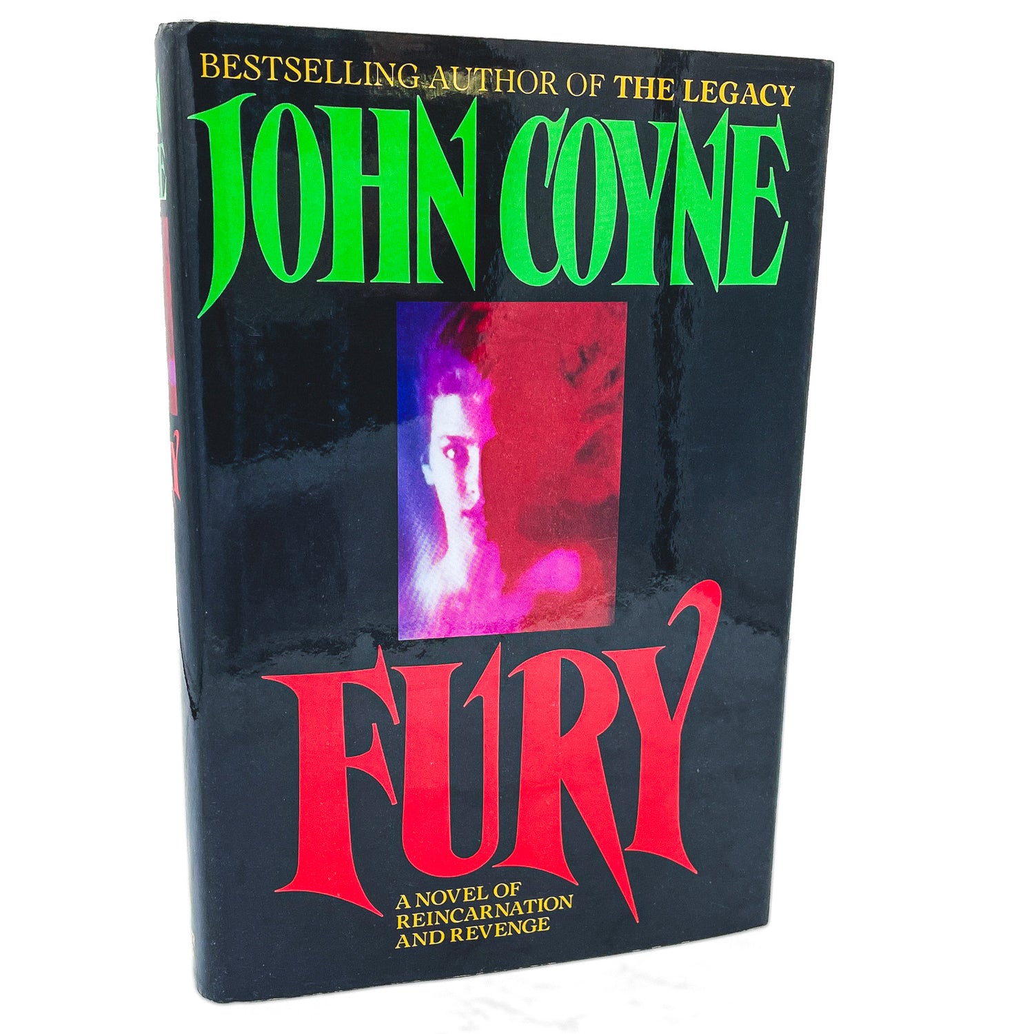 Book cover of 'Fury' by John Coyne with a dark background and colorful text.