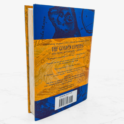 The Golden Compass by Philip Pullman [DELUXE ANNIVERSARY EDITION] 2006 • His Dark Materials #1