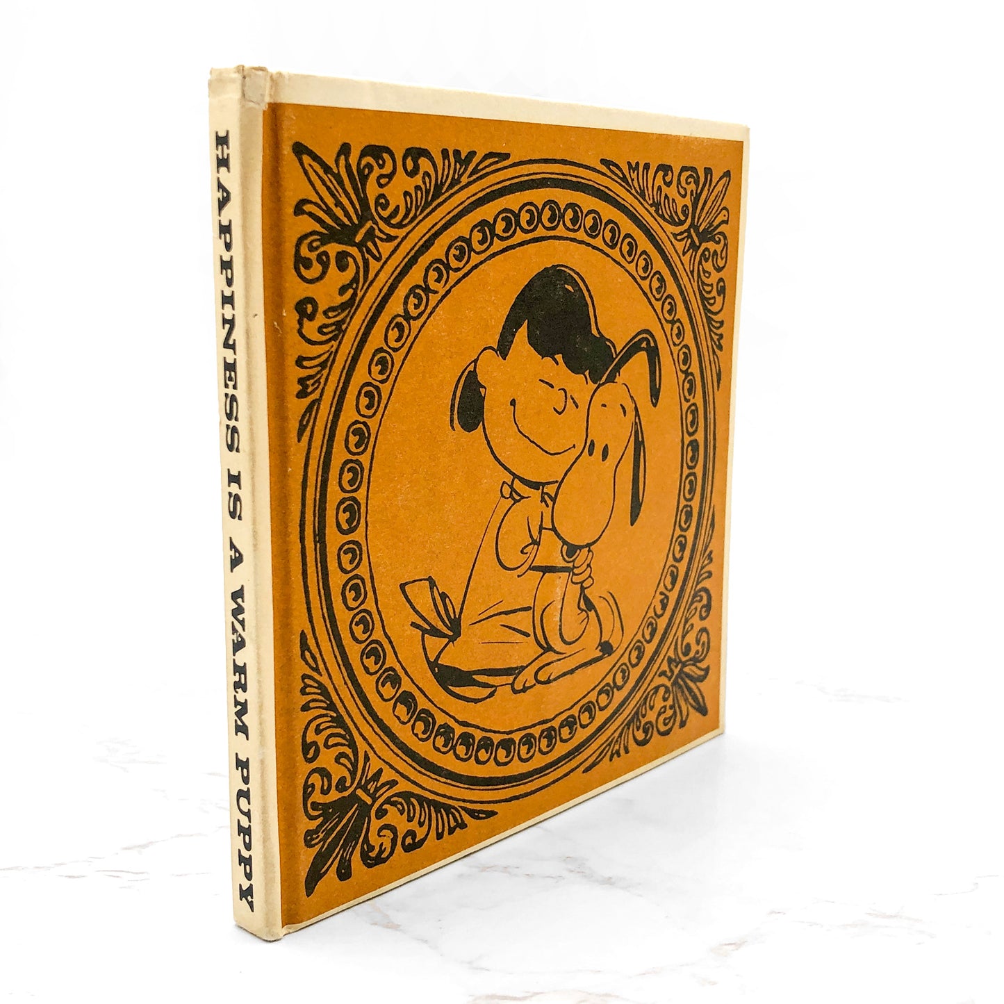 Happiness Is a Warm Puppy by Charles M. Schulz [FIRST EDITION • FIRST PRINTING] 1962 • Hardcover • Determined Productions