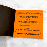 Happiness Is a Warm Puppy by Charles M. Schulz [FIRST EDITION • FIRST PRINTING] 1962 • Hardcover • Determined Productions