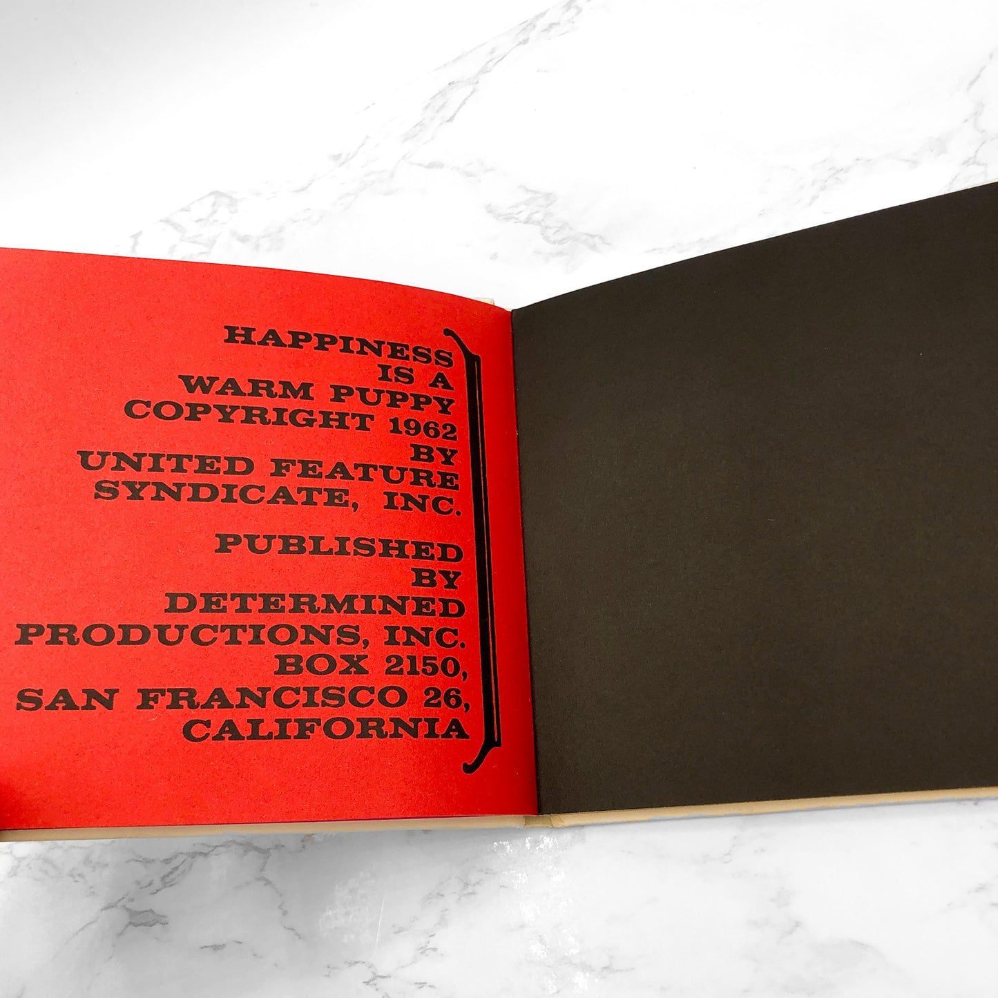 Happiness Is a Warm Puppy by Charles M. Schulz [FIRST EDITION • FIRST PRINTING] 1962 • Hardcover • Determined Productions