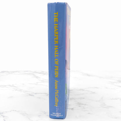 The Harper Hall of of Pern Trilogy (Dragonsong, Dragonsinger, Dragondrums) by Anne McCaffrey [FIRST EDITION OMNIBUS] BCE • 1984 • Doubleday