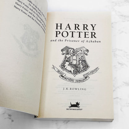 Harry Potter & The Prisoner of Azkaban by J.K. Rowling [FIRST U.K. PAPERBACK EDITION] 1999 • Bloomsbury • 8th Print