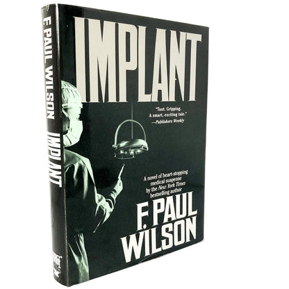Implant by F. Paul Wilson [FIRST BOOK CLUB EDITION] 1995 • Forge / TOR