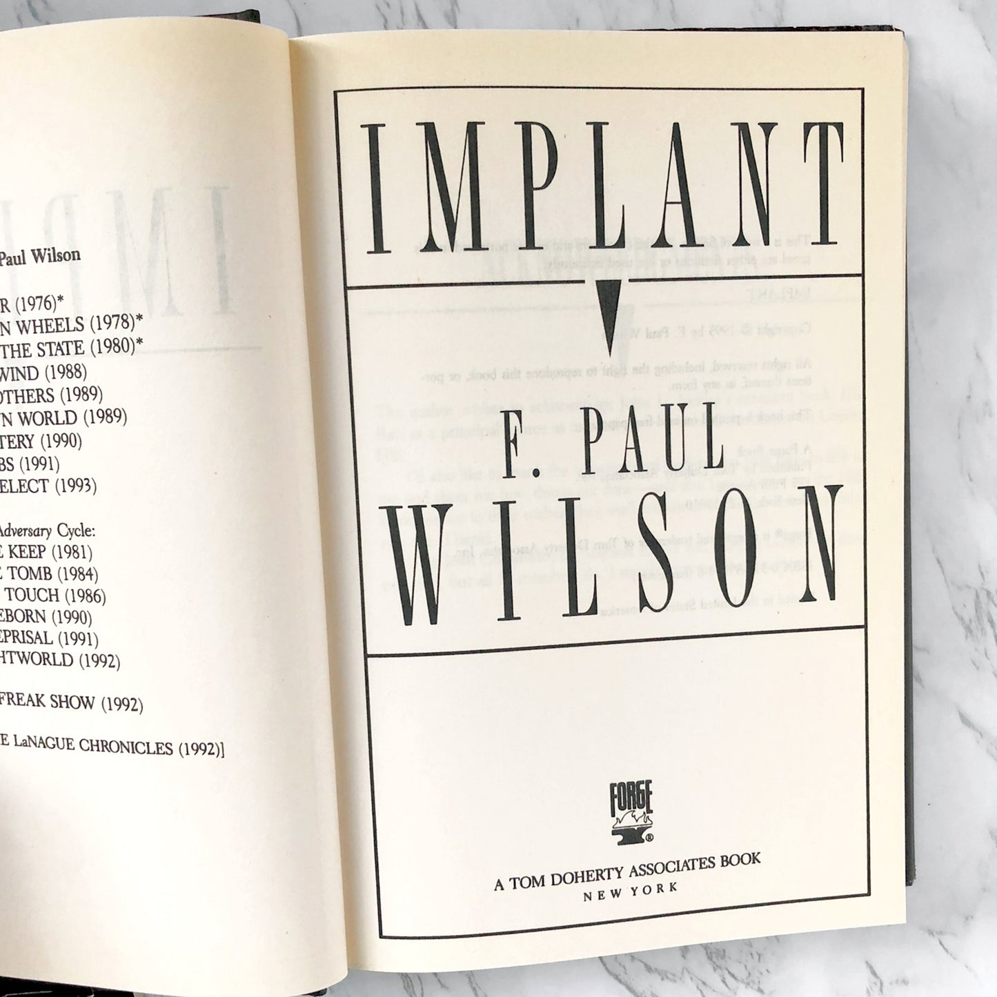 Implant by F. Paul Wilson [FIRST BOOK CLUB EDITION] 1995 • Forge / TOR