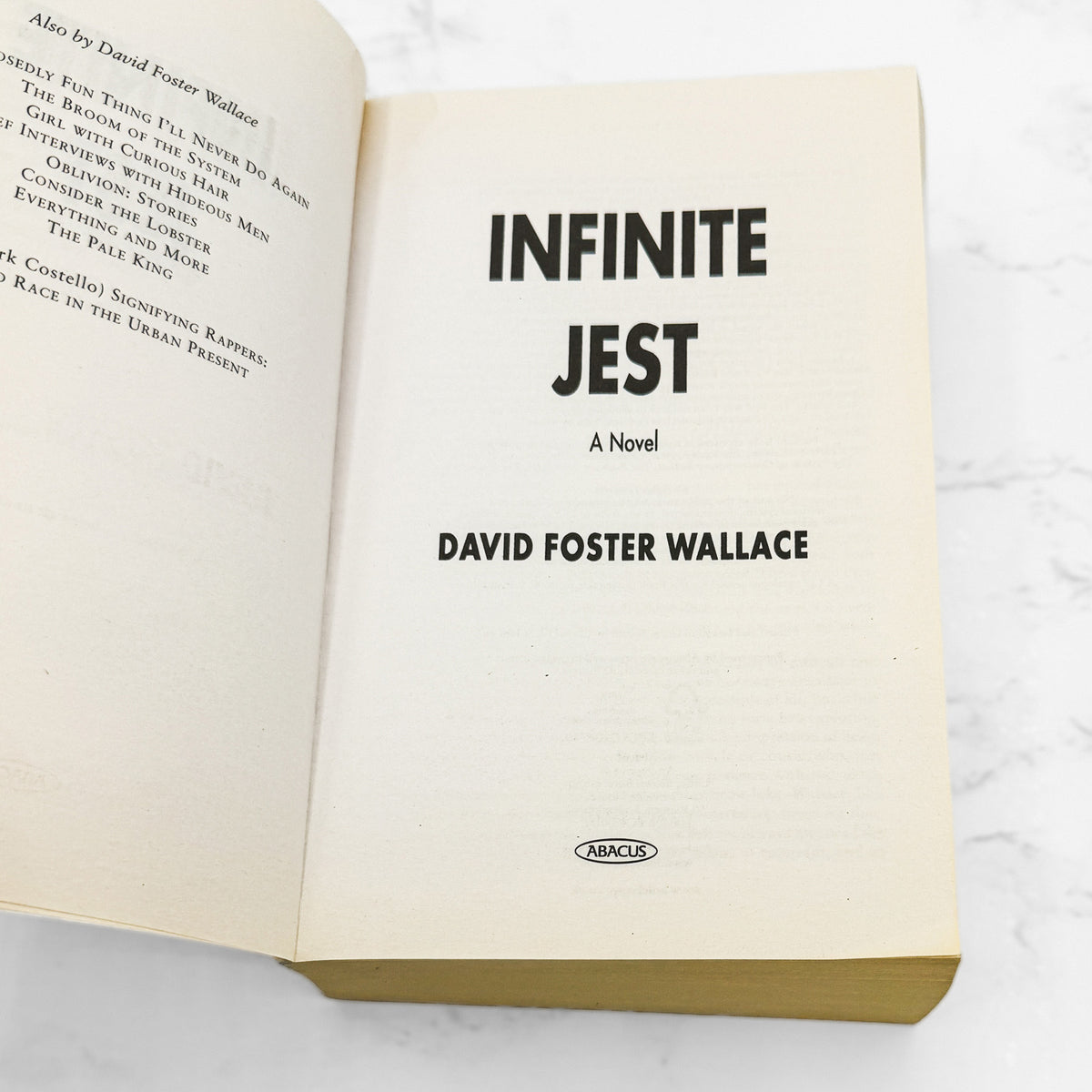 Infinite Jest by David Foster Wallace [U.K. TRADE PAPERBACK] 2008 • Abacus *Condition