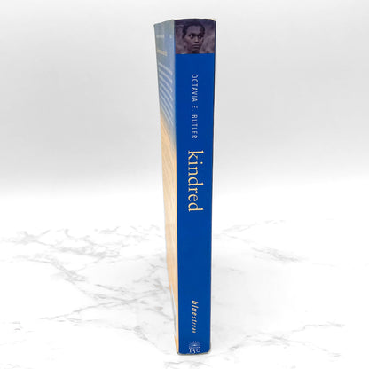 Kindred by Octavia E. Butler [25th ANNIVERSARY PAPERBACK] 2004 • Beacon Press