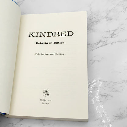 Kindred by Octavia E. Butler [25th ANNIVERSARY PAPERBACK] 2004 • Beacon Press