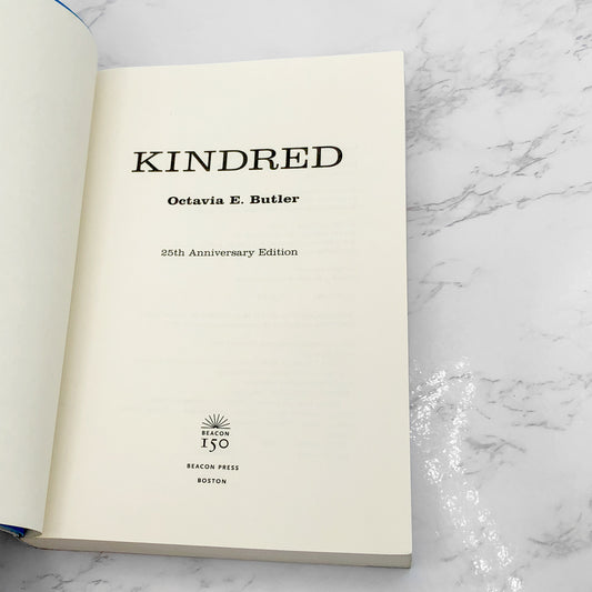Kindred by Octavia E. Butler [25th ANNIVERSARY PAPERBACK] 2004 • Beacon Press