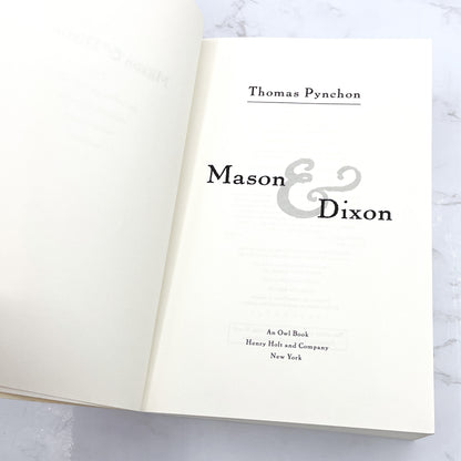 Mason & Dixon by Thomas Pynchon [FIRST PAPERBACK PRINTING] 1998 • Owl Books • Mint