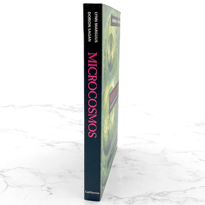 Microcosmos: Four Billion Years of Microbial Evolution by Lynn Margulis & Dorion Sagan [TRADE PAPERBACK RE-ISSUE] 1997 • UC