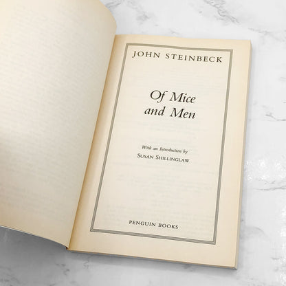 Of Mice And Men by John Steinbeck [TRADE PAPERBACK] 1994 • Penguin Books