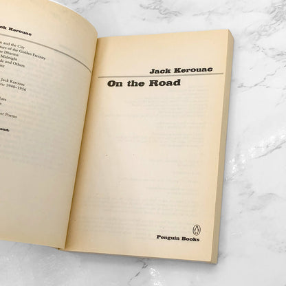 On the Road by Jack Kerouac [1976 TRADE PAPERBACK] • Penguin • 90's Ginsberg Cover