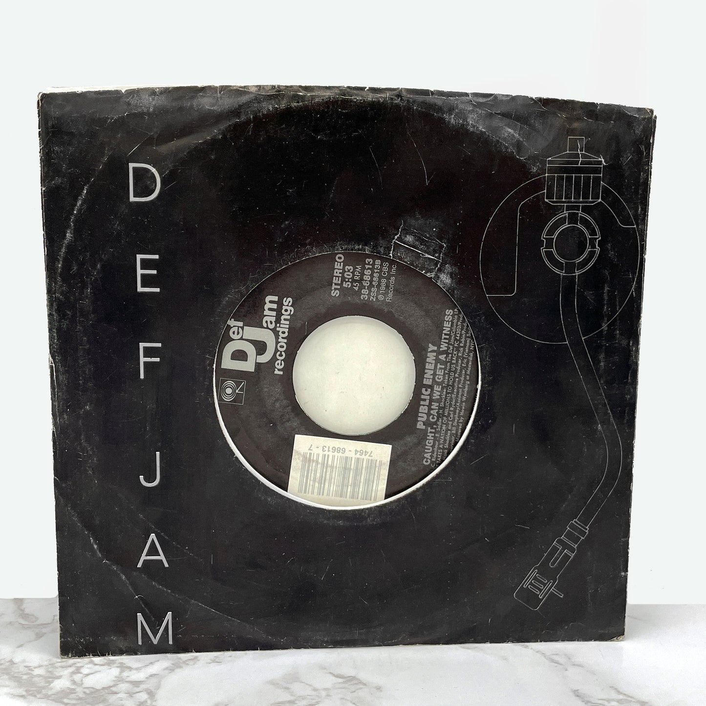 Public Enemy – Black Steel In The Hour Of Chaos b/w Caught Can I Get a Witness [7" VINYL SINGLE] 1988 • Def Jam