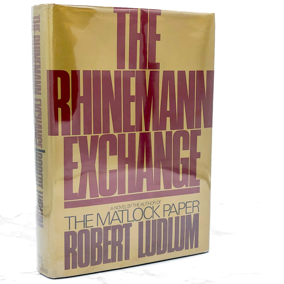The Rhinemann Exchange by Robert Ludlum [FIRST EDITION • FIRST PRINTING] 1974 • The Dial Press