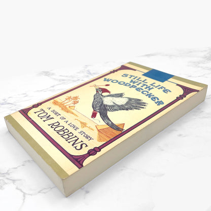 Still Life with Woodpecker by Tom Robbins [FIRST EDITION PAPERBACK • FIRST PRINTING] 1980 • Bantam