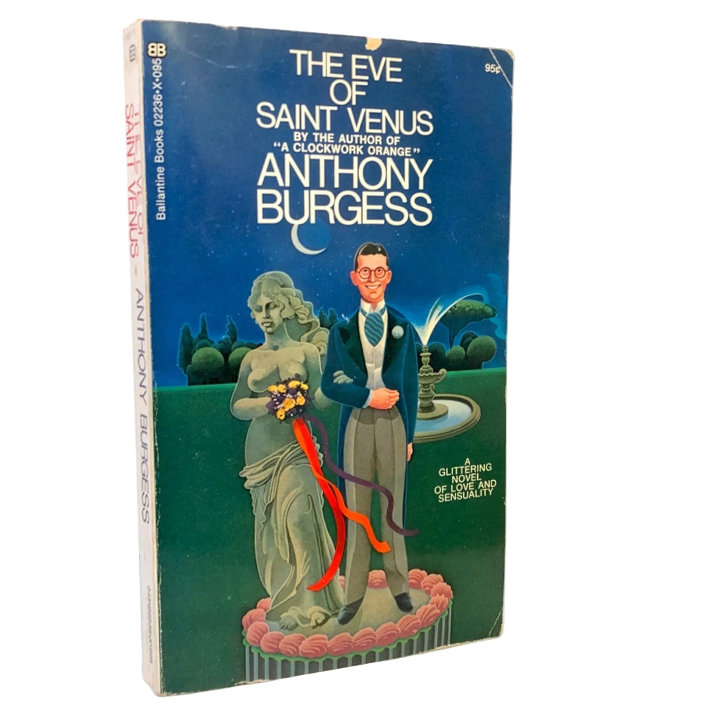 The Eve of Saint Venus paperback book by Anthony Burgess, published by Ballantine Books. The cover features a dark blue and green illustration of a classical statue and a man in a suit, with the title in bold white text.
