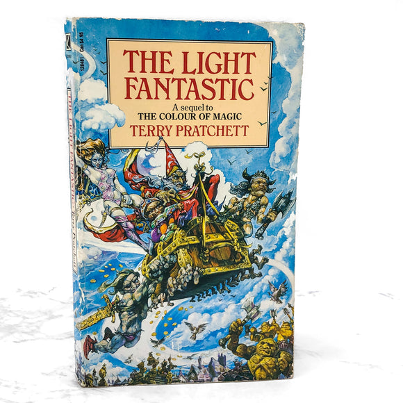 The Light Fantastic by Terry Pratchett [FIRST U.K PAPERBACK EDITION] • 5th Printing / 1988 • Corgi