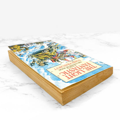 The Light Fantastic by Terry Pratchett [FIRST U.K PAPERBACK EDITION] • 5th Printing / 1988 • Corgi