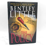 The Policy by Bentley Little [FIRST HARDCOVER EDITION] 2003 • Signet