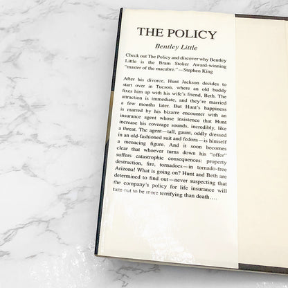 The Policy by Bentley Little [FIRST HARDCOVER EDITION] 2003 • Signet