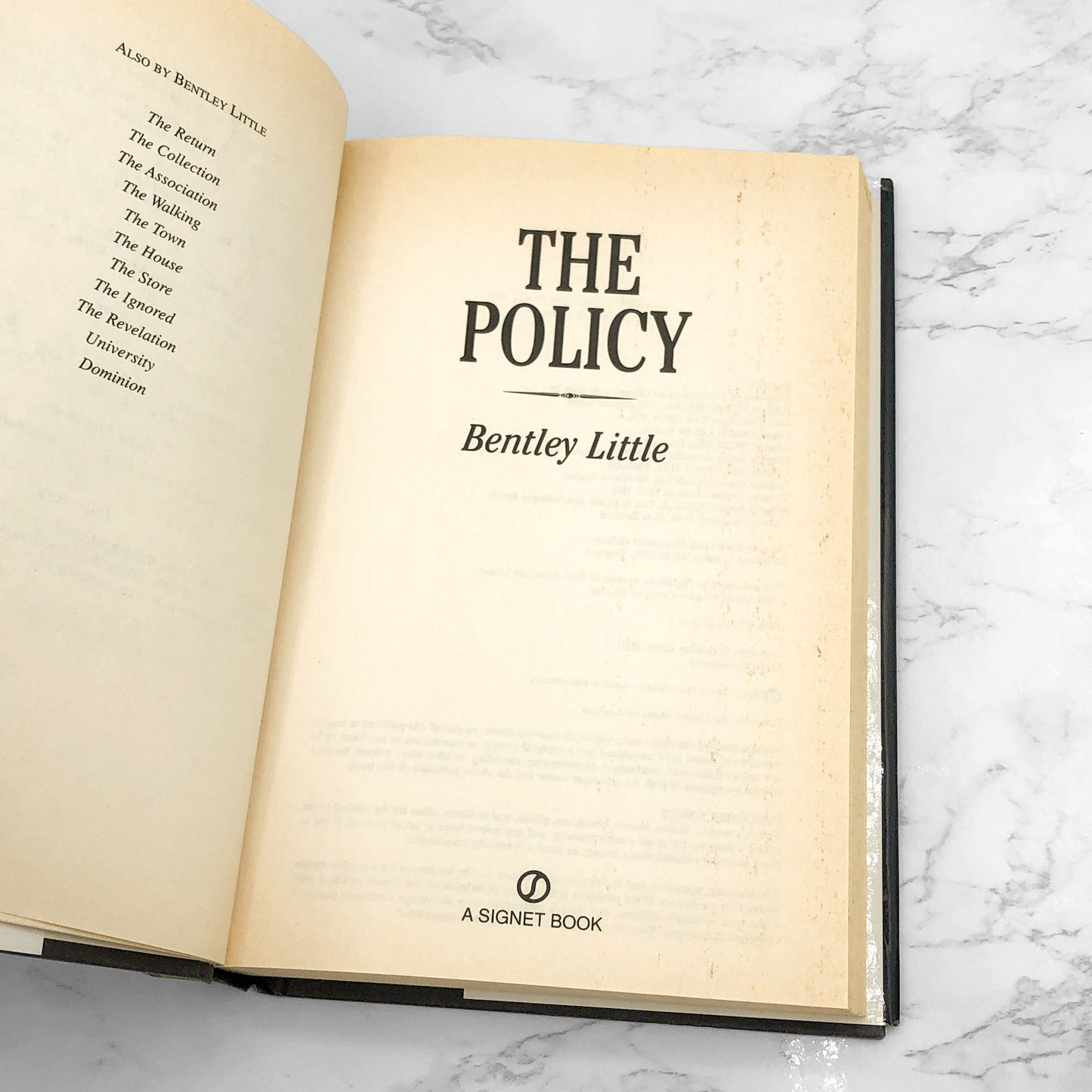 The Policy by Bentley Little [FIRST HARDCOVER EDITION] 2003 • Signet